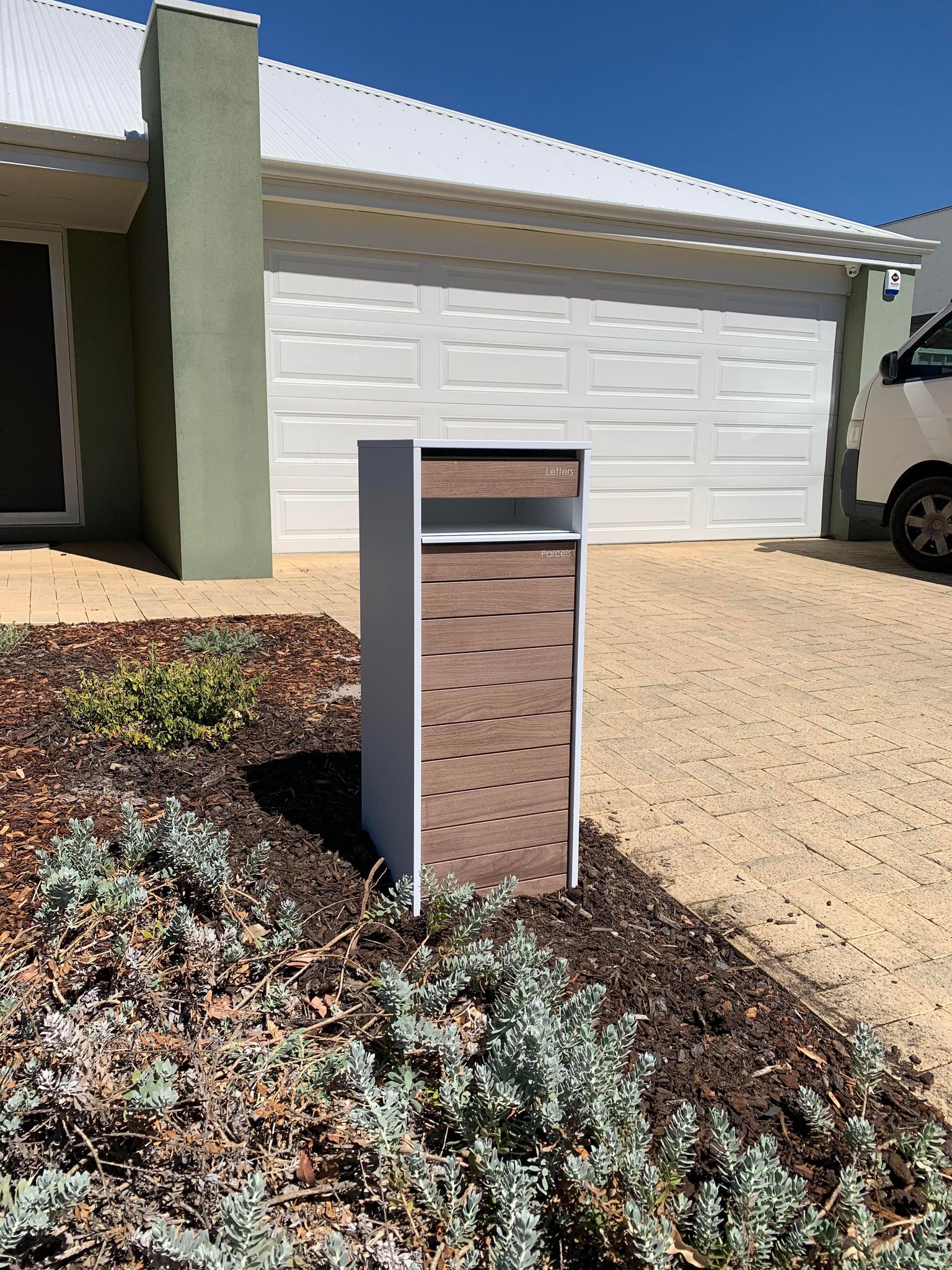 Milkcan Hamilton Parcel & Mail Pillar