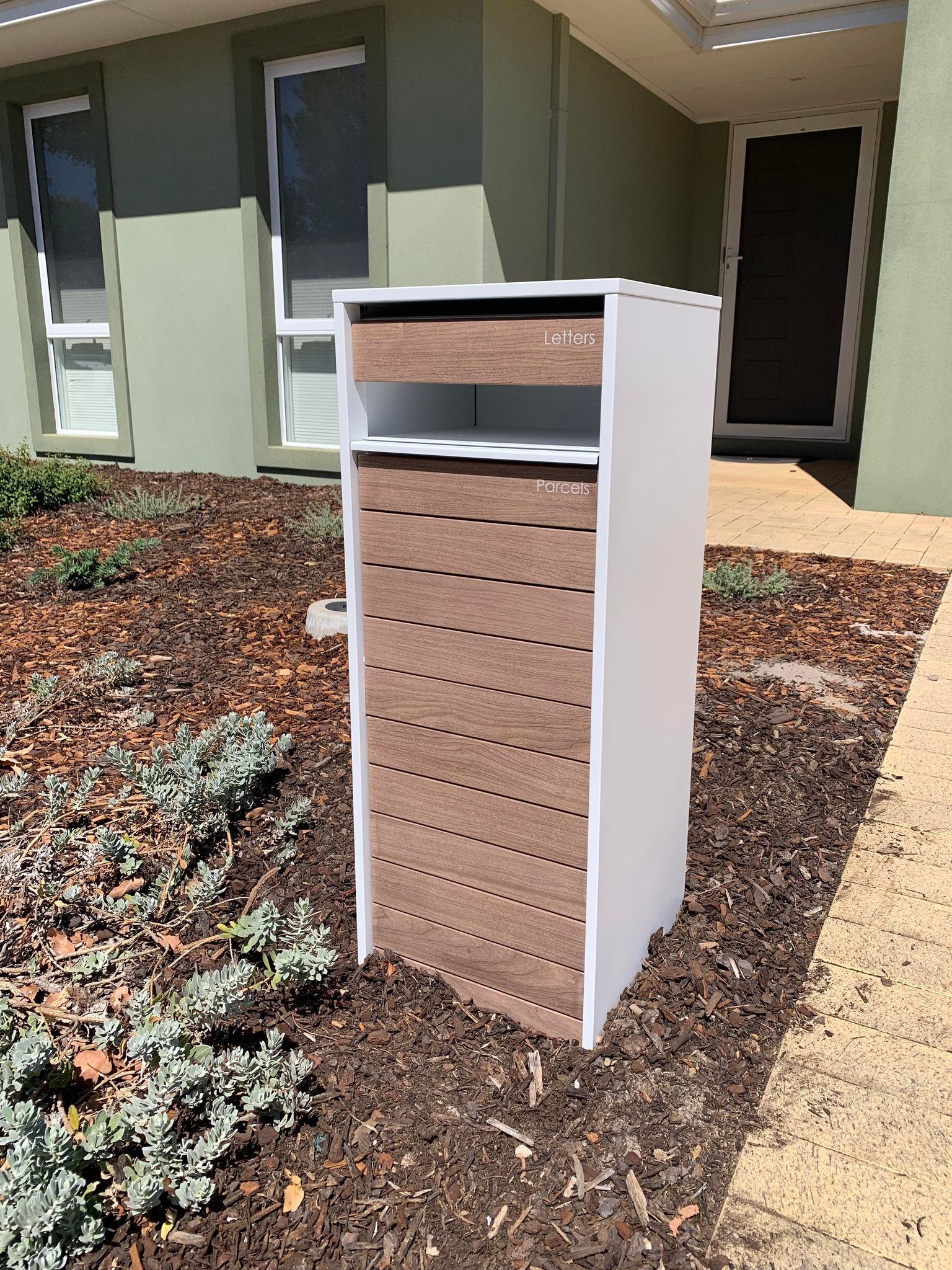 Milkcan Hamilton Parcel & Mail Pillar