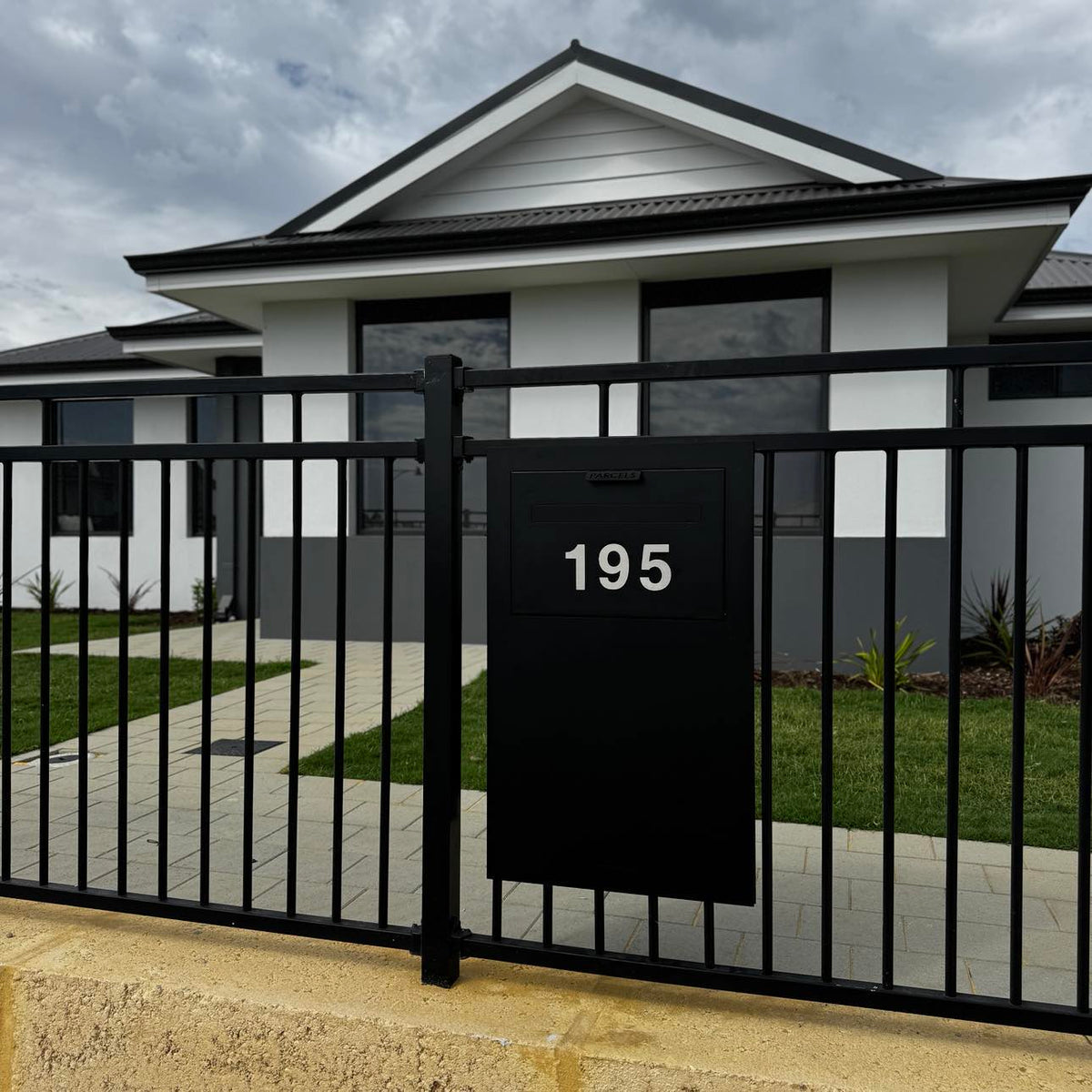 Milkcan Zurich Parcel & Mail Fence / Brick