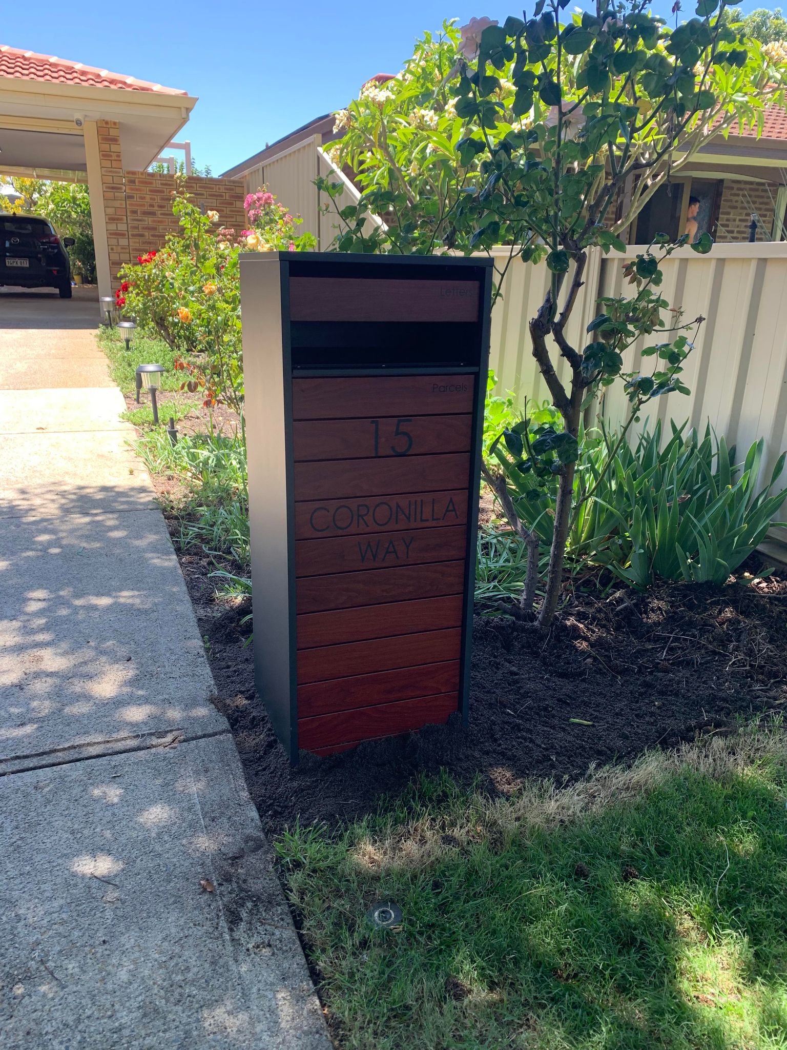 Milkcan Hamilton Parcel & Mail Pillar