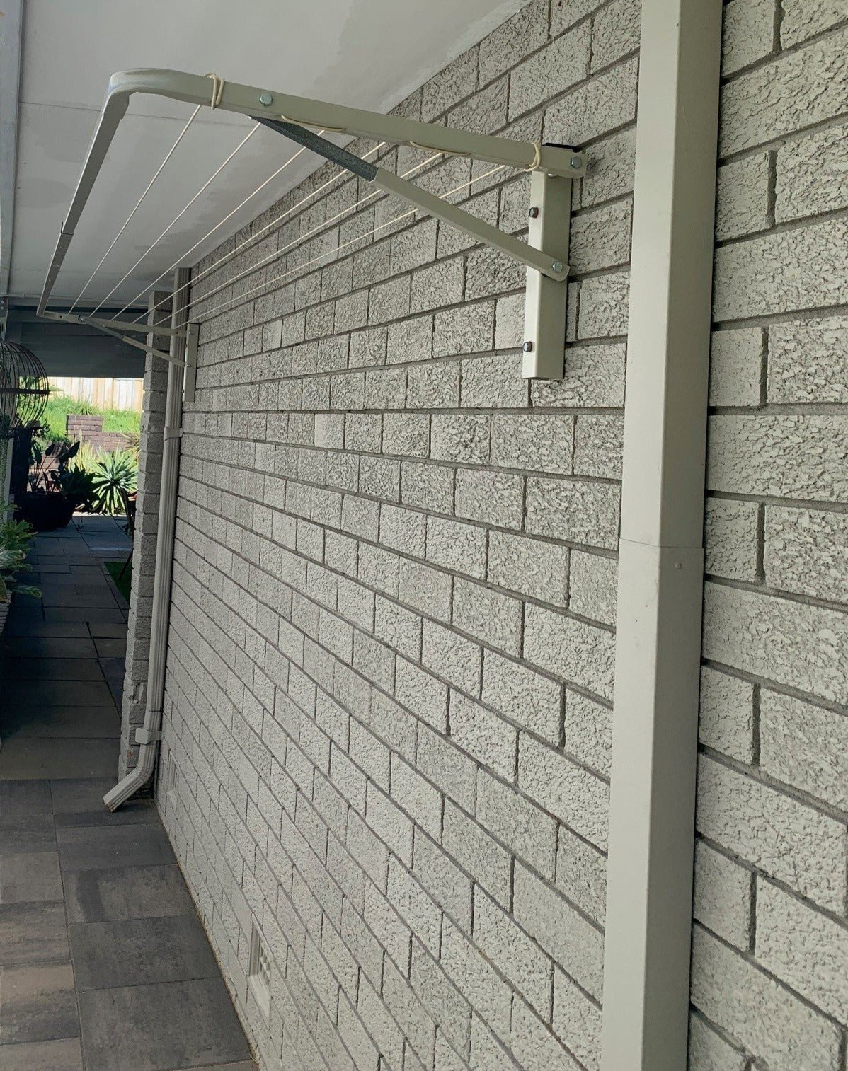 City Living Evening Haze Folding Frame Clothesline wallmount on brick-Aussie Clotheslines & Letterboxes