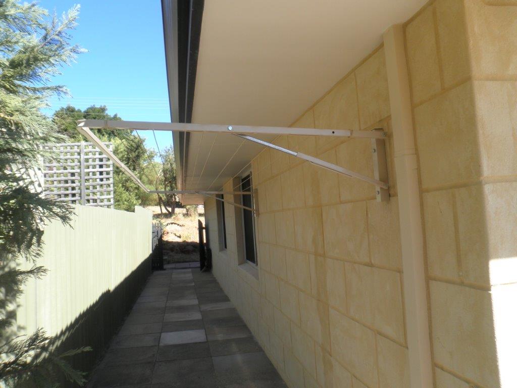 City Living Wideline 3000 x 900 wall mount on brick-Aussie Clotheslines & Letterboxes