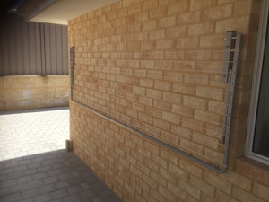 City Living Wideline 3000 x 900 Wall Mount closed on brick-Aussie Clotheslines & Letterboxes