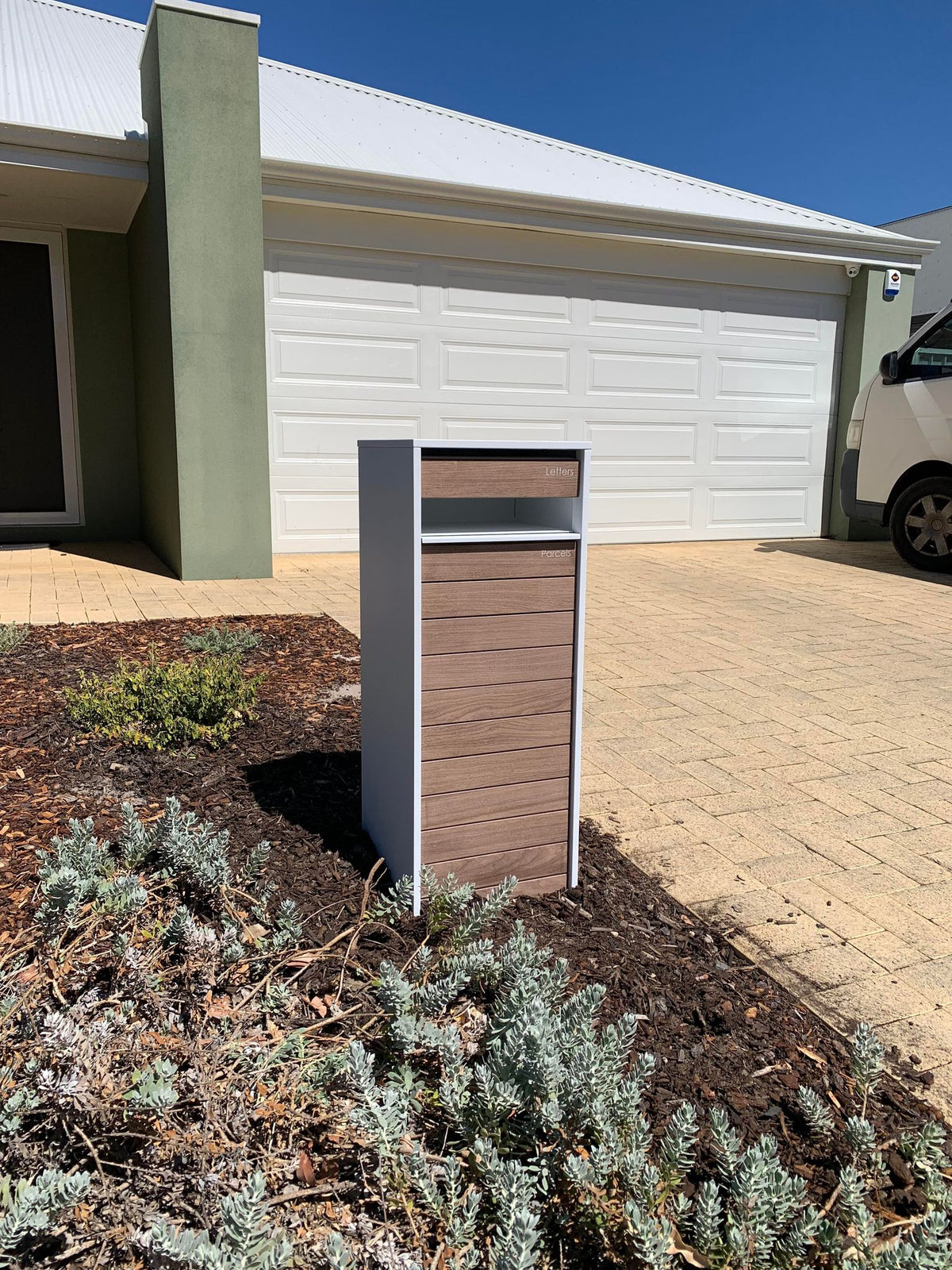 Milkcan Hamilton Parcel & Mail Pillar