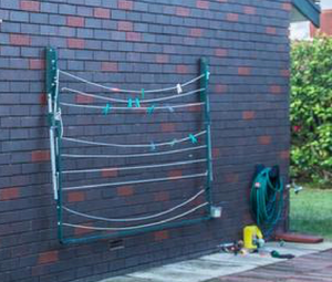 Old Sagging Folding Frame Clothesline in need of restringing and rewiring - Aussie Clotheslines & Letterboxes